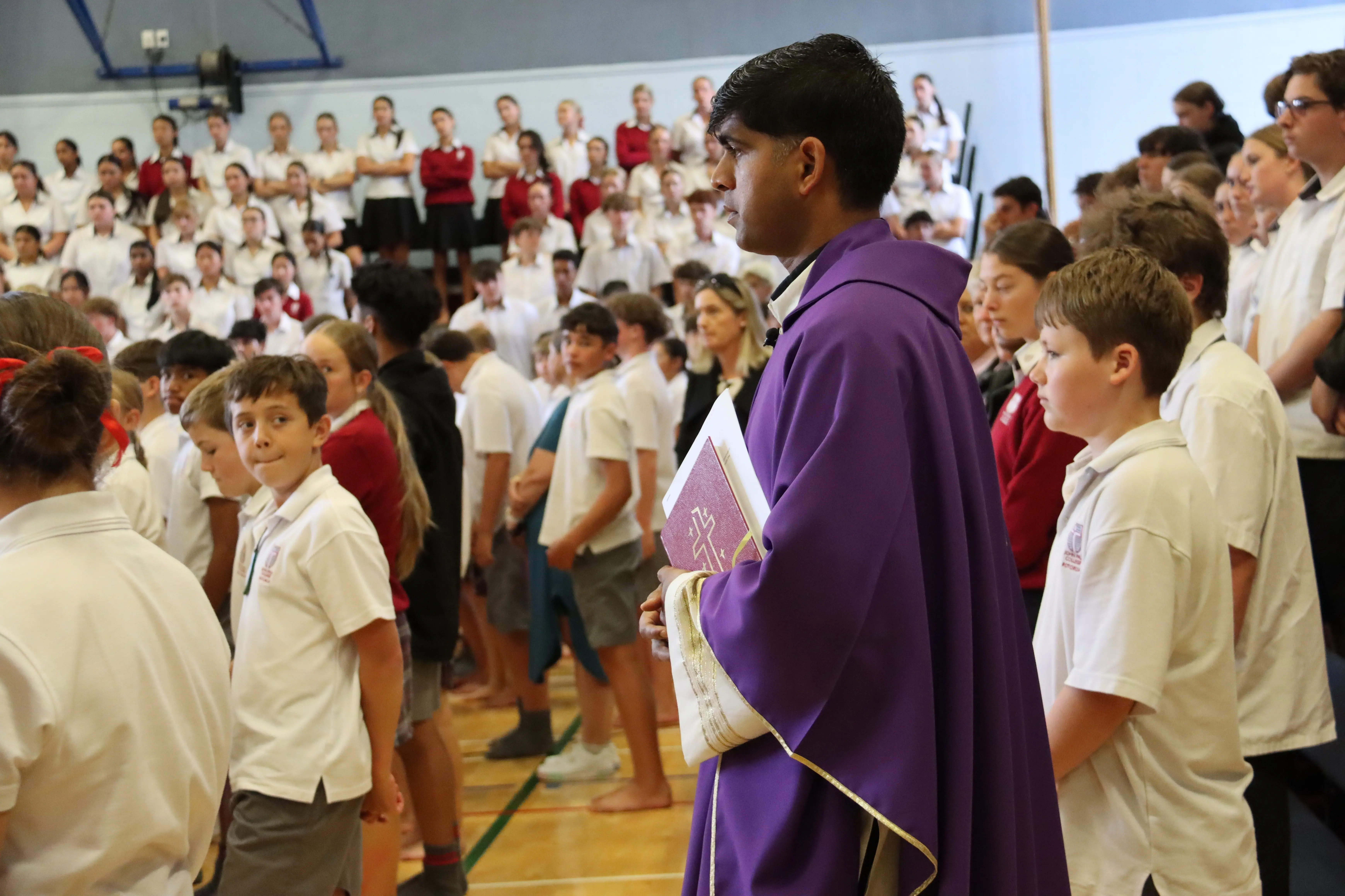 Image of Father Prakesh with the student body