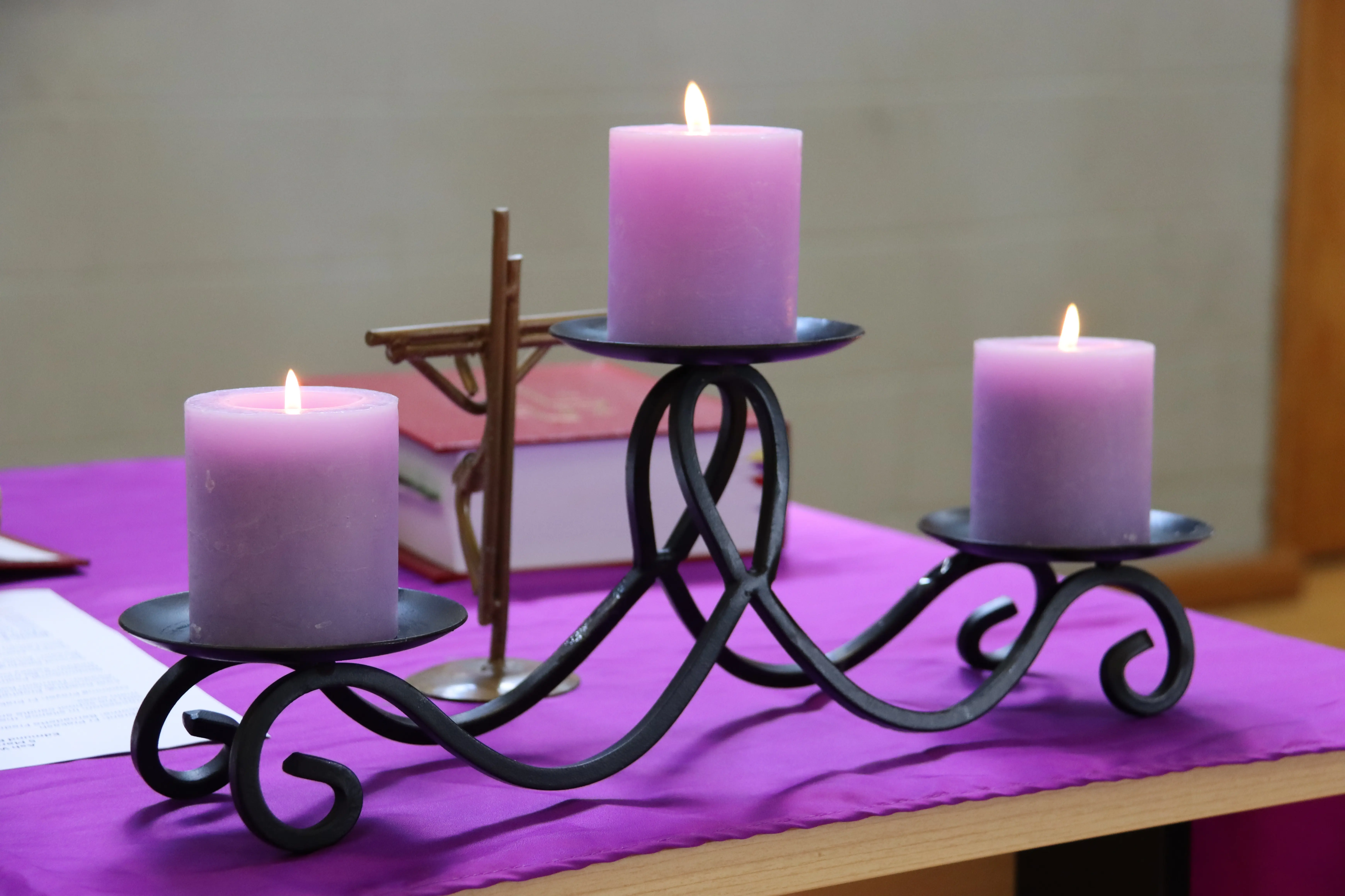 Image of purple lit candles