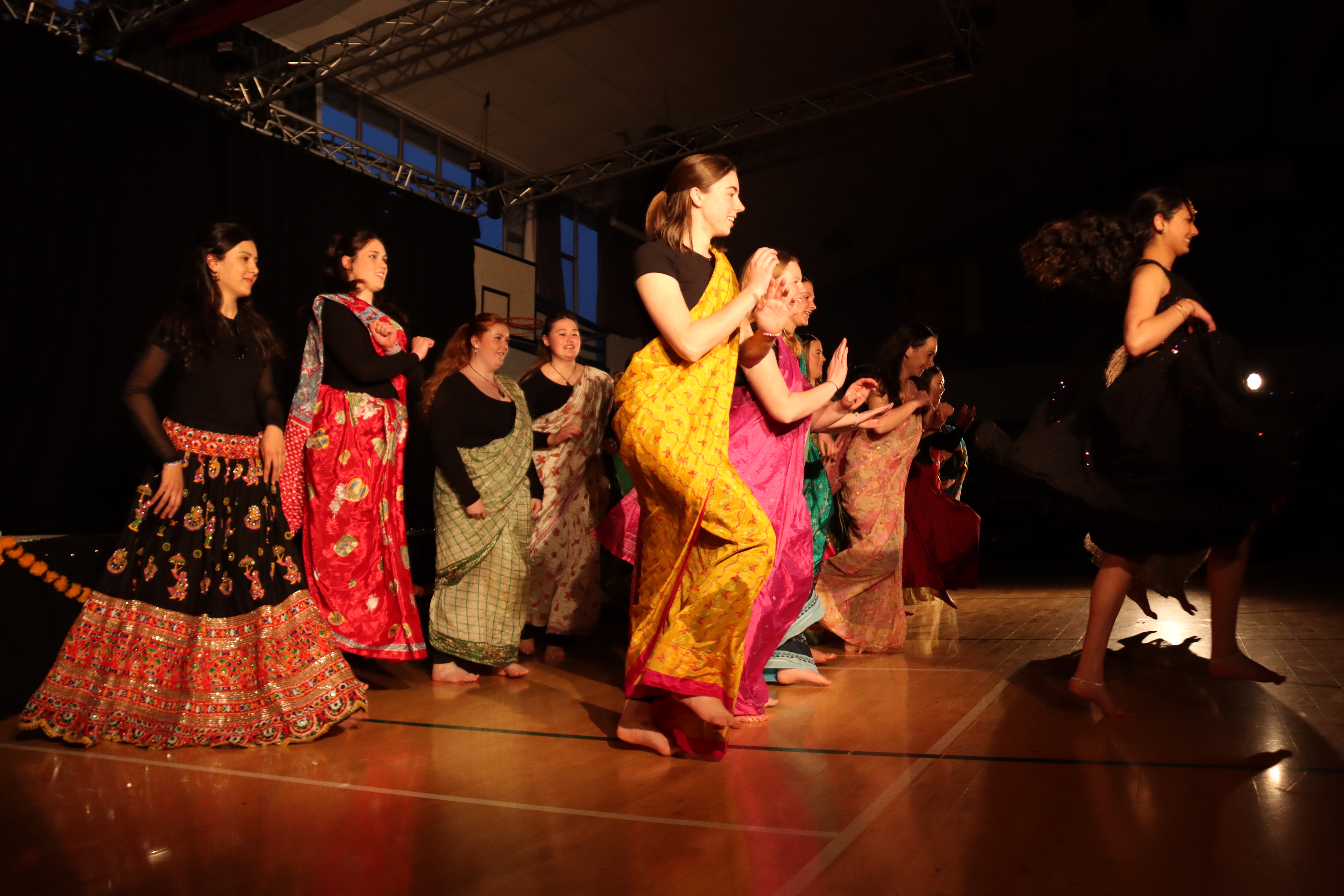 Image of the Diwali Event at School with people dancing