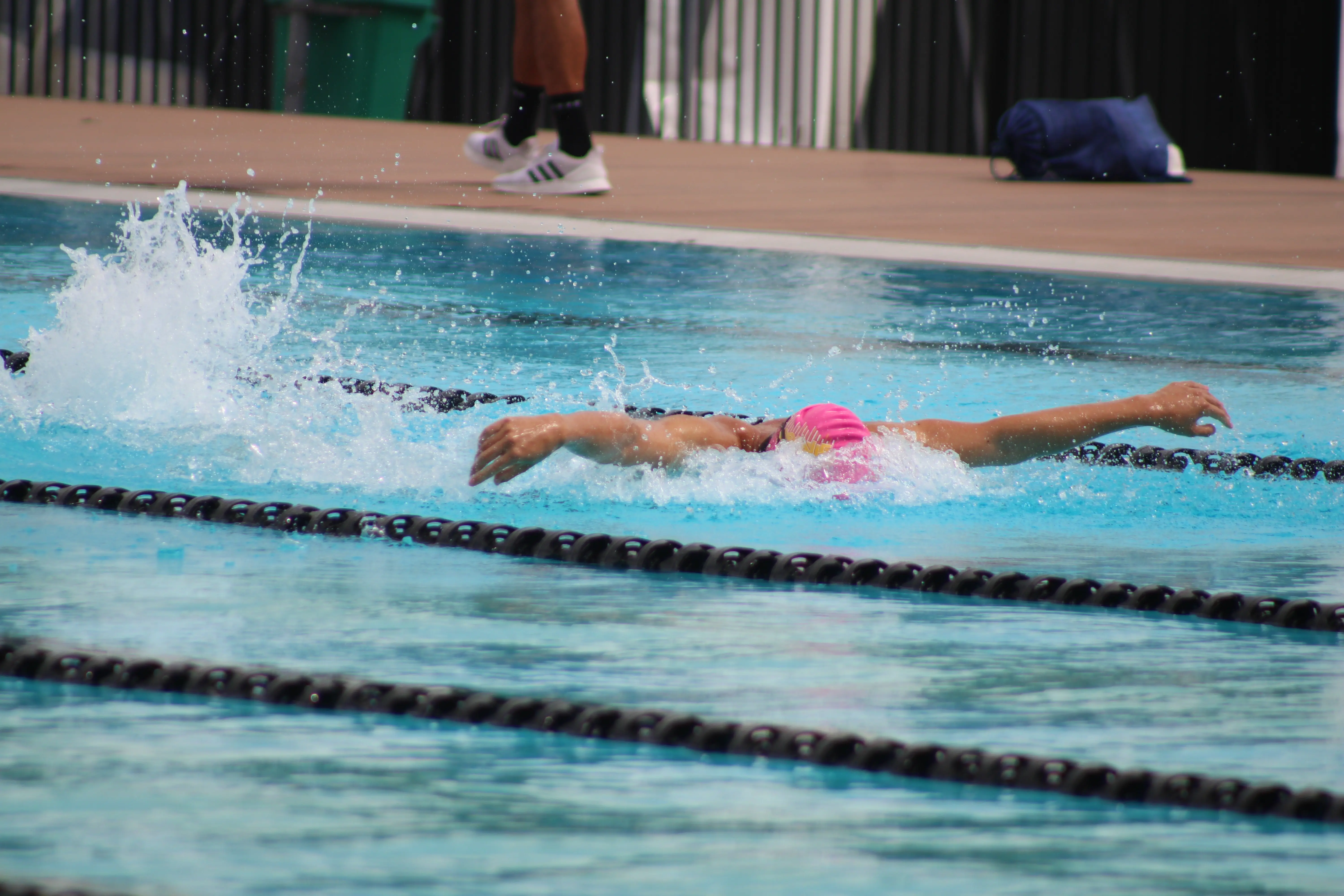 Image of a girl in the middle of swimming her lap