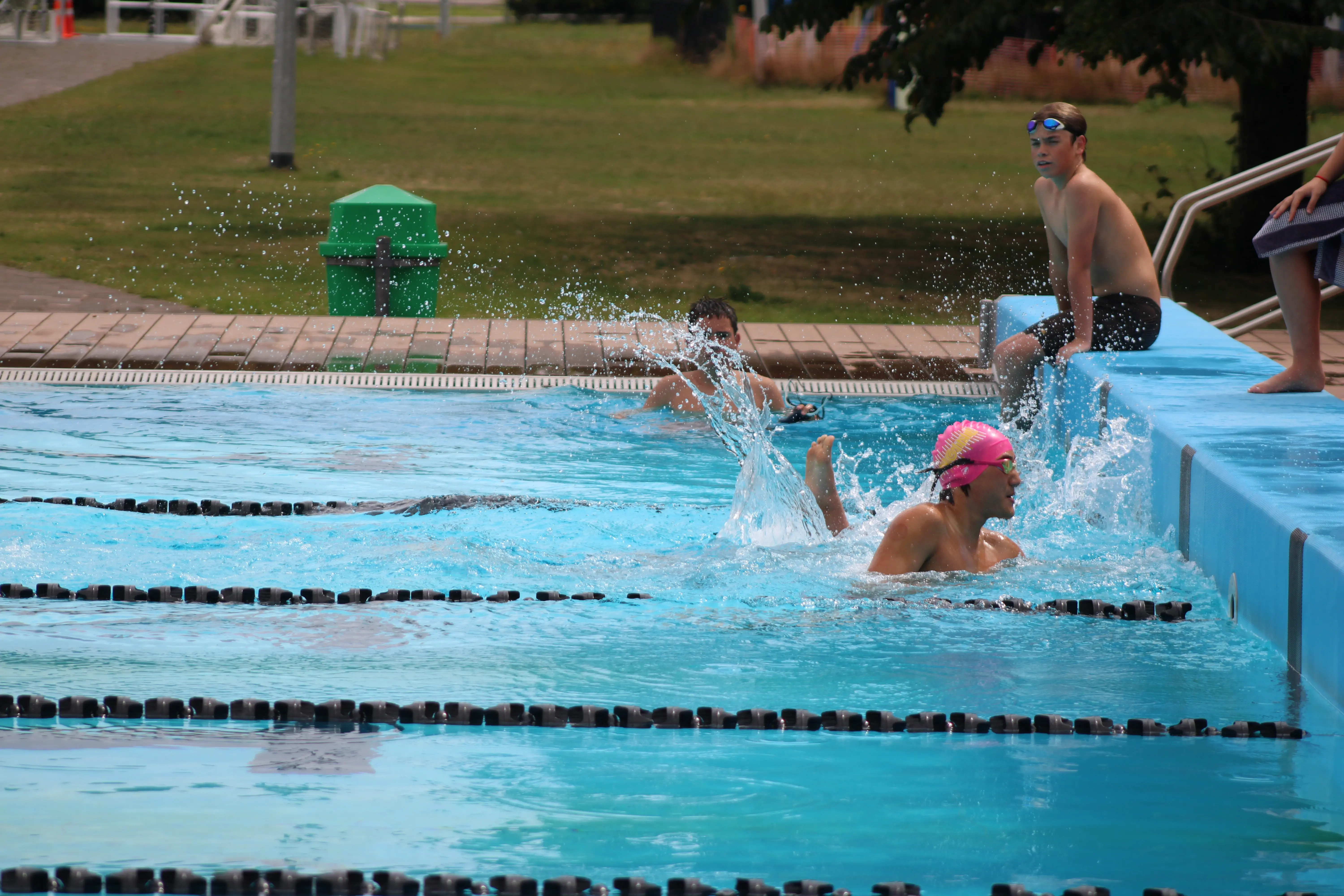 Image of a girl at the end of the pool